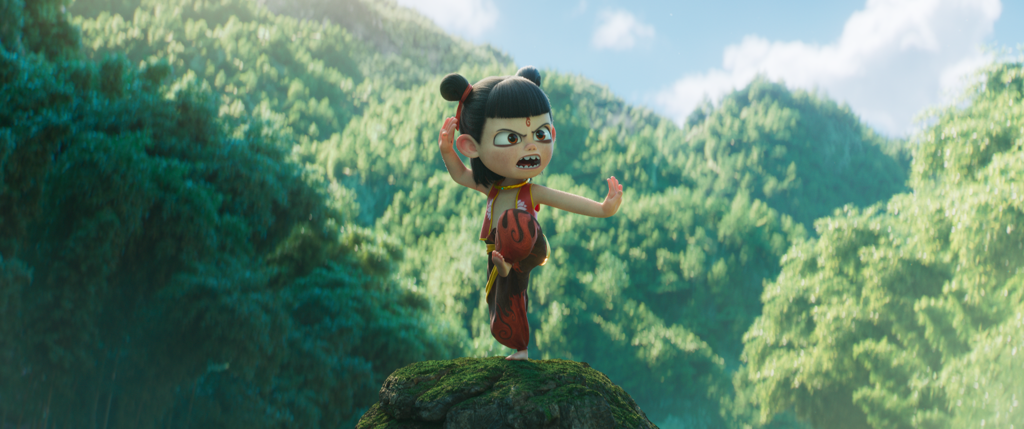 Ne Zha 2 (2025): young Ne Zha balances on a rock with one palm raised against a green forest