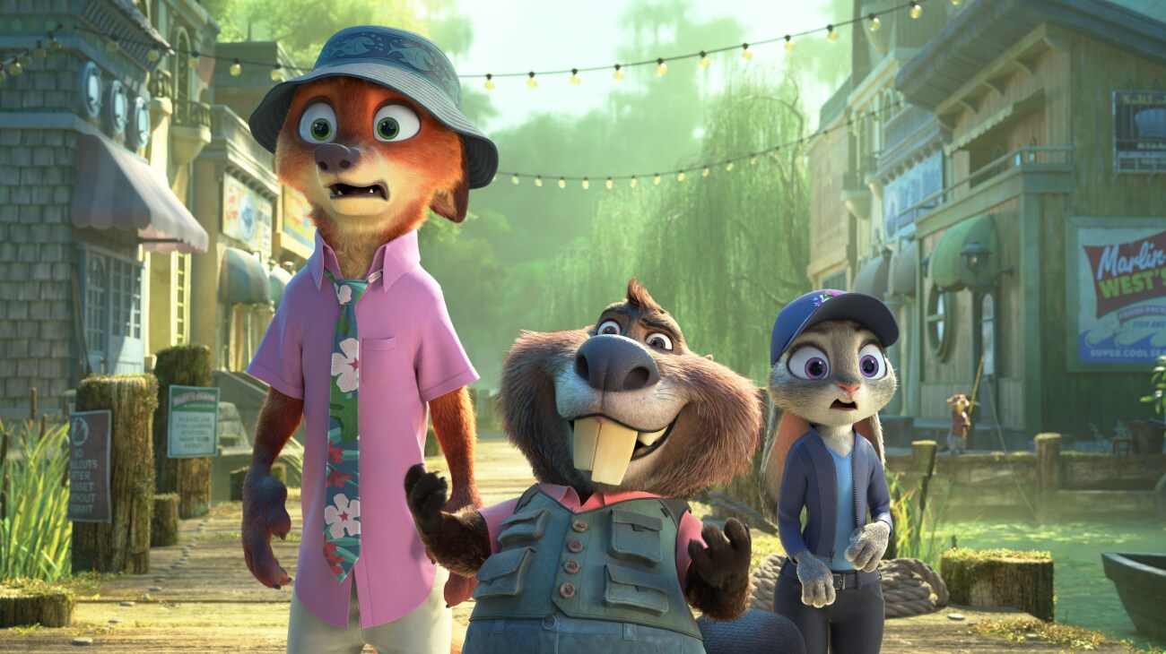 Zootopia 2 (2025) — Nibbles joins Nick and Judy Zootopia 2 (2025): Nick in a bucket hat, Nibbles in a helmet and goggles, and Judy in a blue police cap stand on a street