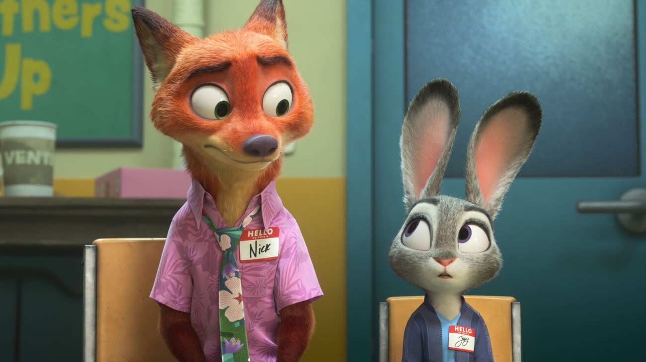 Zootopia 2 (2025) — Two partners learning to listen Zootopia 2 (2025): Nick Wilde in a pink shirt and Judy Hopps in blue sit on chairs wearing name badges